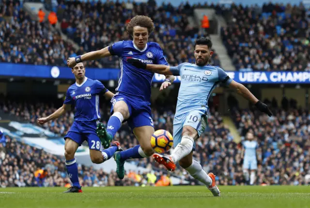 Aguero and Hazard fight for the ball