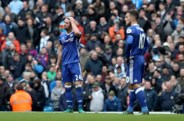 Gary Cahill looks on