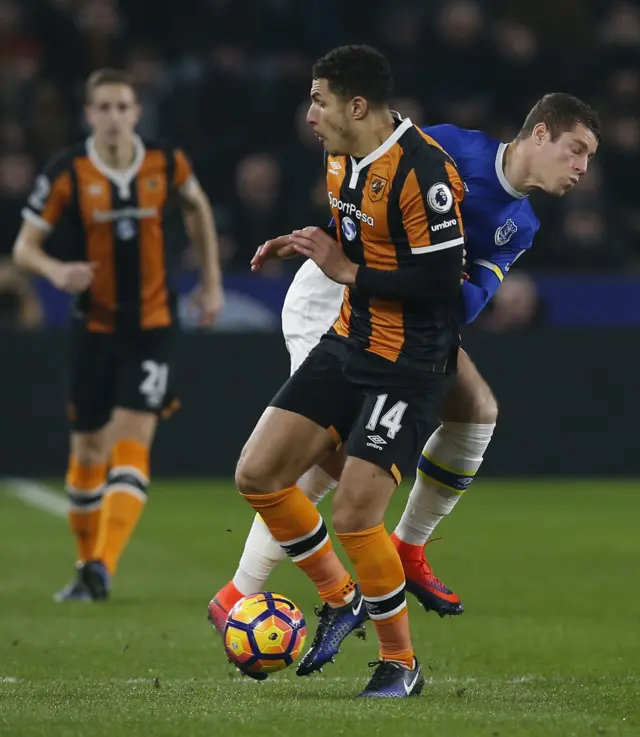 Jake Livermore of Hull in action with Everton's Ross Barkley