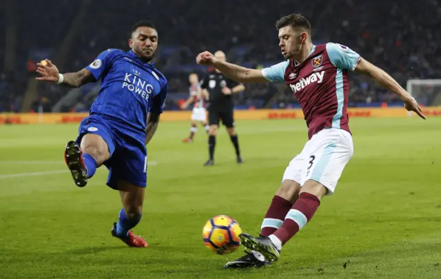 Aaron Cresswell passes the ball