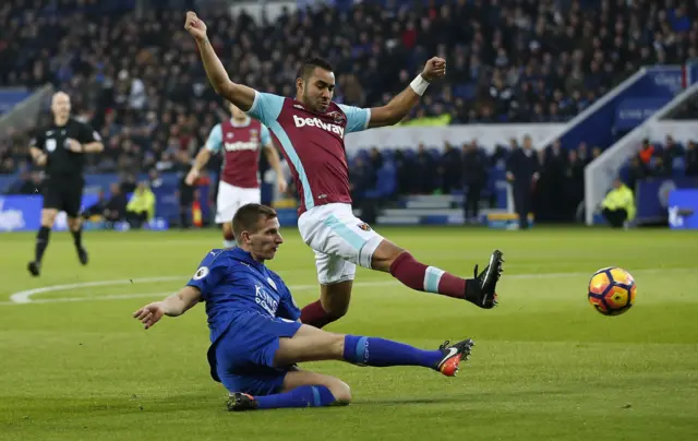 Marc Albrighton kicks the ball