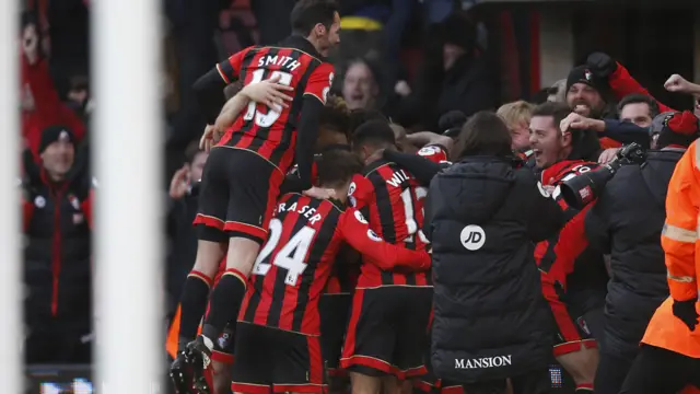 Nathan Ake celebrates