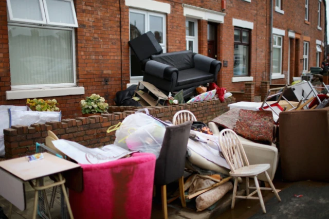 Flood debris outside home