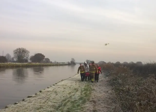 Fire crews rescue woman from canal