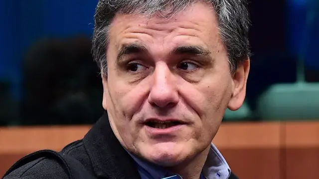 Greece's Finance Minister Euclid Tsakalotos arrives to take part in a Eurogroup finance ministers meeting at the European Council in Brussels, on 5 December 2016