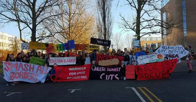 Protesters with banners