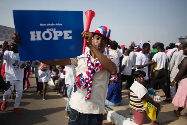 An NPP supporter at a campaign rally