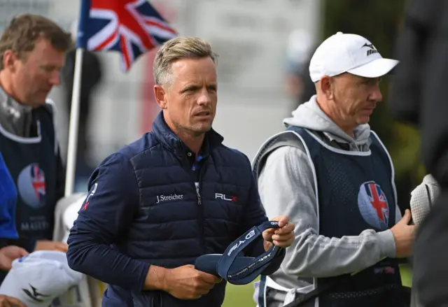 Luke Donald walks at the Open