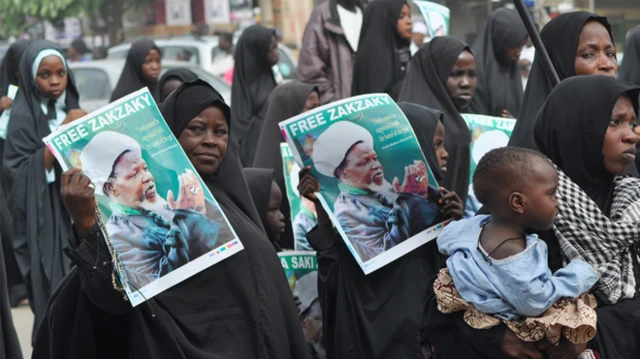 Shia supporters in Nigeria holding posters of their leader Sheikh Ibraheem Zakzaky