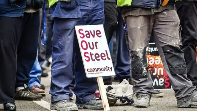 Steel workers protest outside the Tata Port Talbot plant in South Wales.