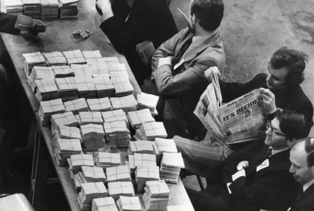 Election officials count ballots in the 1975 referendum