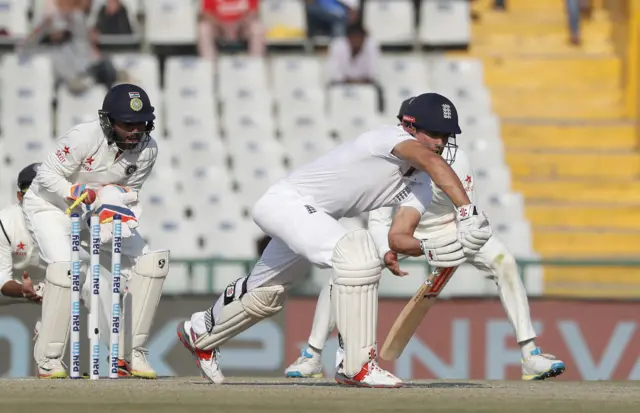 Alastair Cook is bowled out by India's Ravichandran Ashwin on the third day of the third Test in Mohali