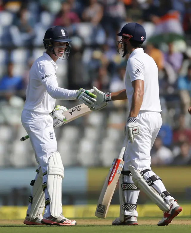 England captain Alastair Cook congratulates Keaton Jennings on his half-century