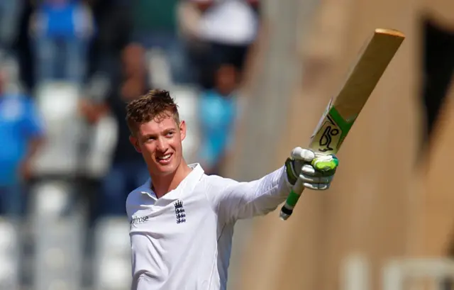 Jennings points his bat in celebration