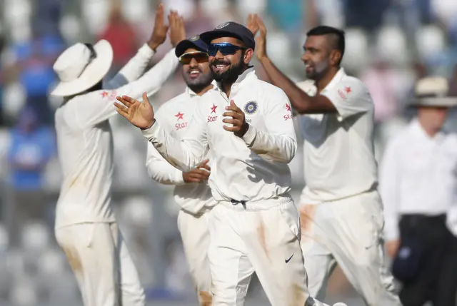 India celebrate the dismissal of England's Jonny Bairstow