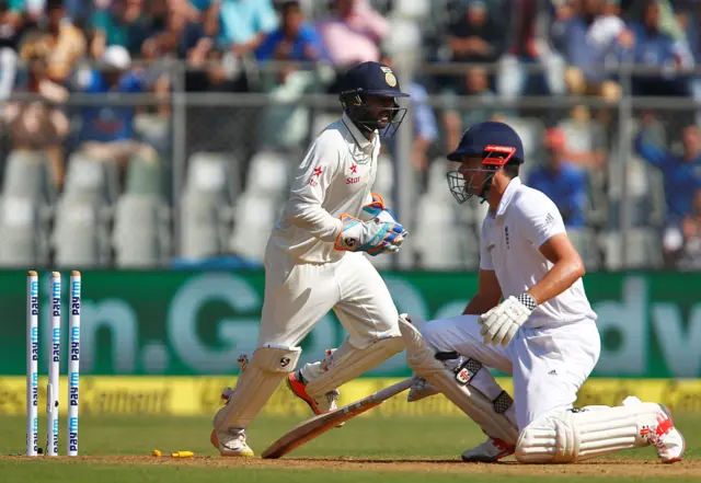 Alastair Cook is stumped by India's Parthiv Patel