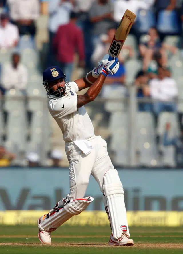 India's Vijay hits a six