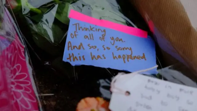 Tributes left outside the scene