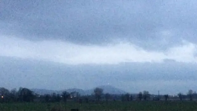 Cloud over field