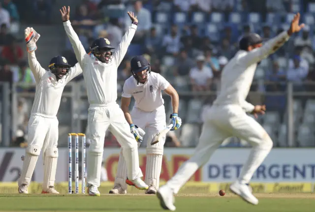 India appeal for the wicket of Jos Buttler