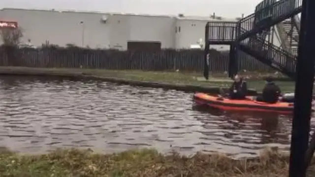 Police searching banks of River Don