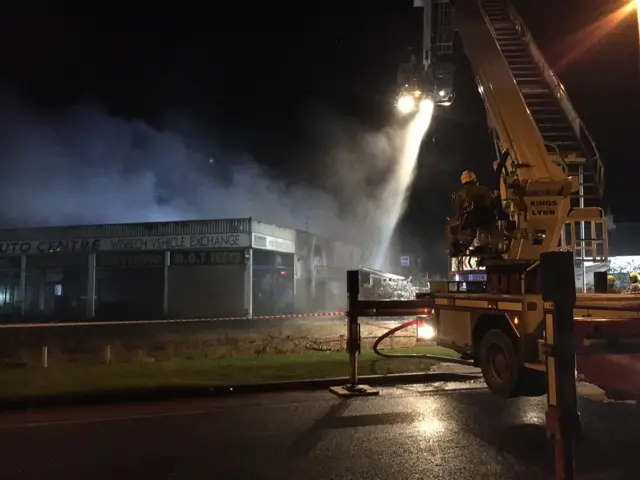 Firefighters putting out a fire