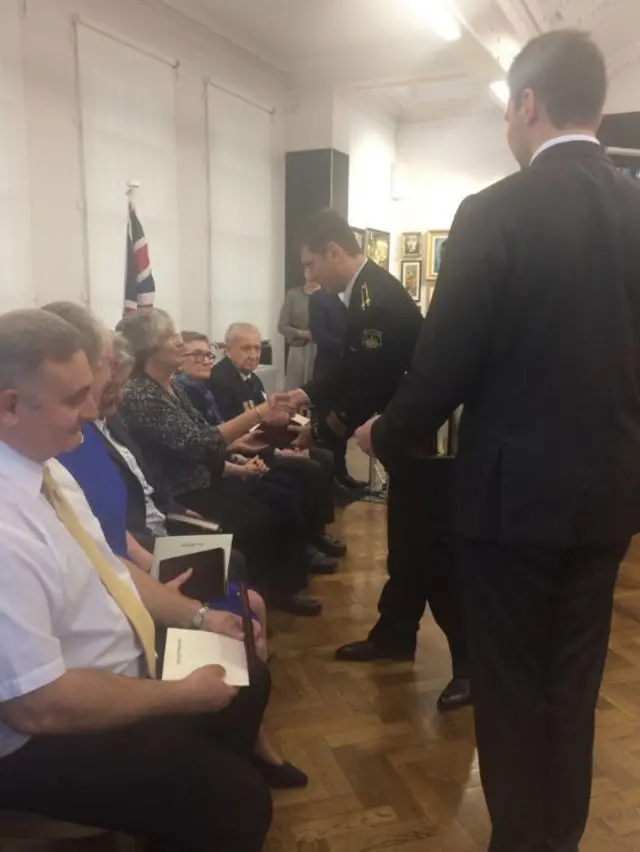 Veterans and their families are being presented with the Russian 'Ushakov Medal'.