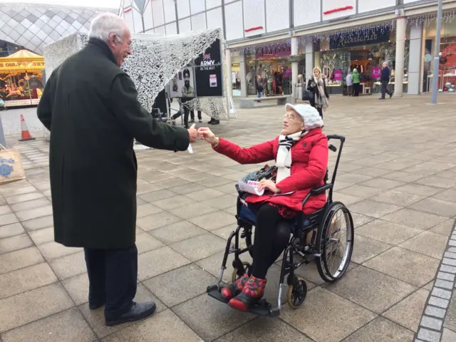 Mary Mckeague handing out leaflets at the Arc shopping centre in Bury St Edmunds