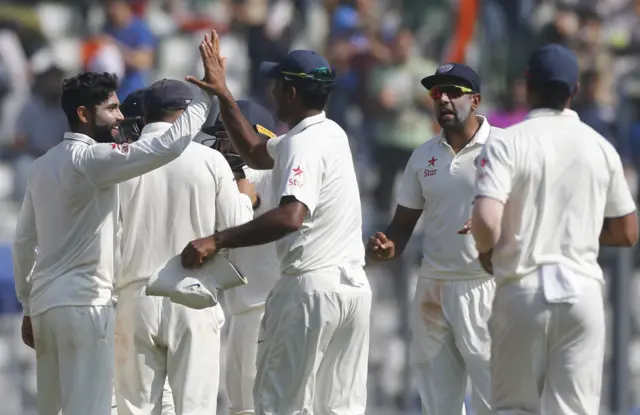 India celebrate the wicket of Adil Rashid