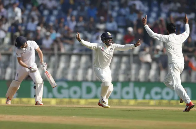 England's Chris Woakes loses his wicket