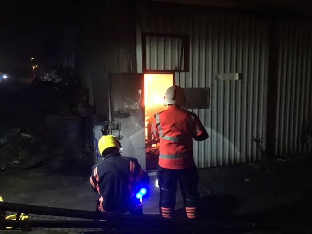 Firefighters putting out a fire