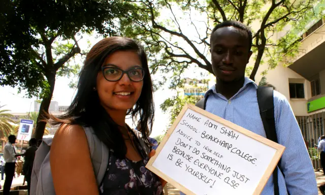 Aditi Shah displaying her board with her advice to pupils