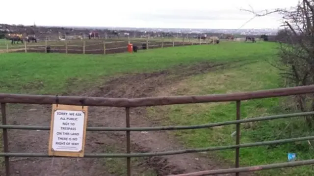 Members of the public have been asked not to trespass on the land off Beacon Road. Horses, which can be seen in the background, are now grazing on the land