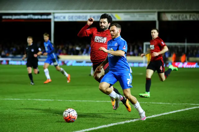 Jon Taylor runs with possession