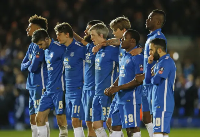 Peterborough players watch on