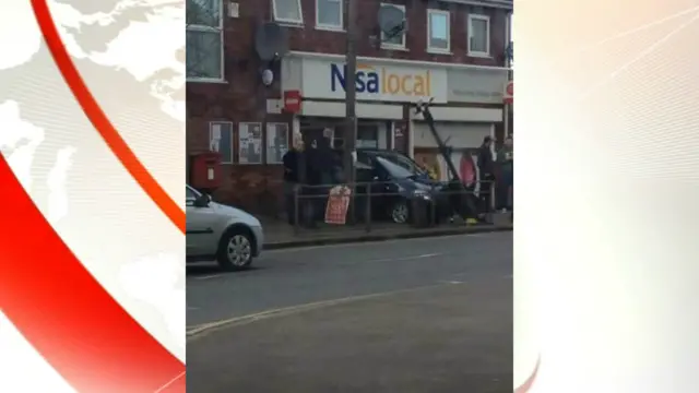 Car crashes into shop