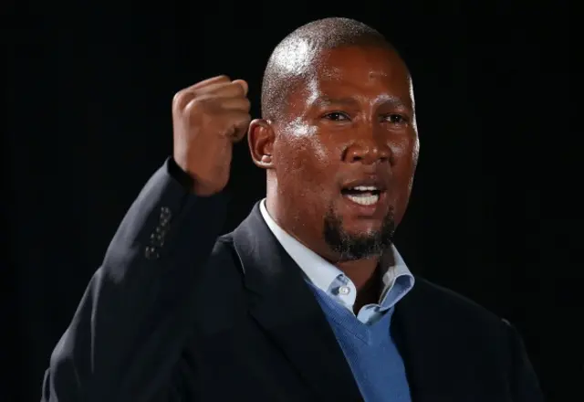 Mandla Mandela, the grandson of former South African President Nelson Mandela, speaks during an African National Congress (ANC) led alliance send off ceremony at Waterkloof military airbase on December 14, 2013 in Pretoria, South Africa