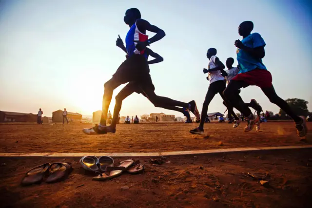 South Sudanese runners, selected by the South Sudanese Athletic Federation, train in the open field of the Buluk Athletics Track in Juba, on February 10, 2016