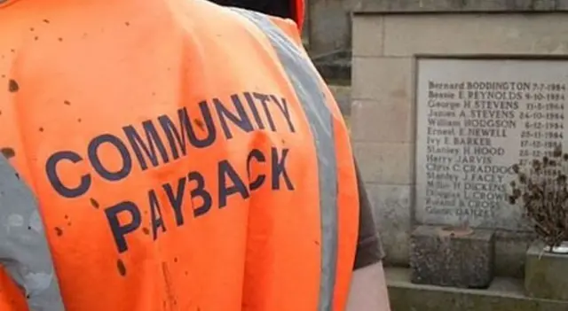 Offender in community payback vest