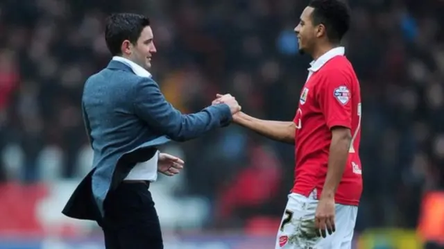 Lee Johnson (left) made Korey Smith his captain at Oldham Athletic