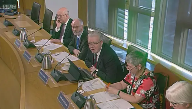 SNP MSP Mike Russell sits alongside other MSPs on the Standards Committee