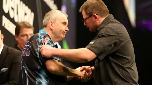 Phil Taylor and James Wade