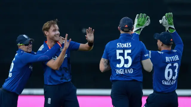 Stuart Broad celebrates taking the wicket of Hashim Amla