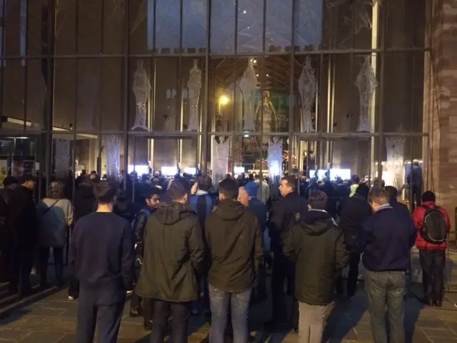 Fans listening outside