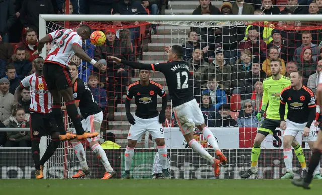 Lamine Kone scores a header