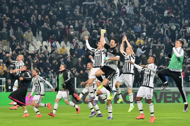 Juventus players celebrate at full time