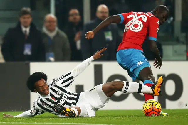 Juan Cuadrado makes a tackle