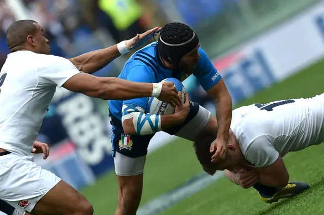 Edoardo Gori of Italy is tackled