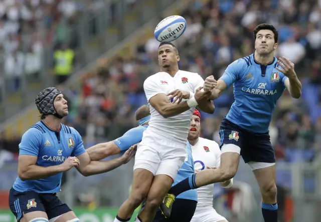 Anthony Watson of England competes for the ball