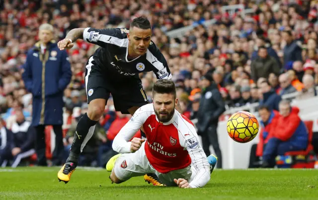 Danny Simpson fouls Olivier Giroud